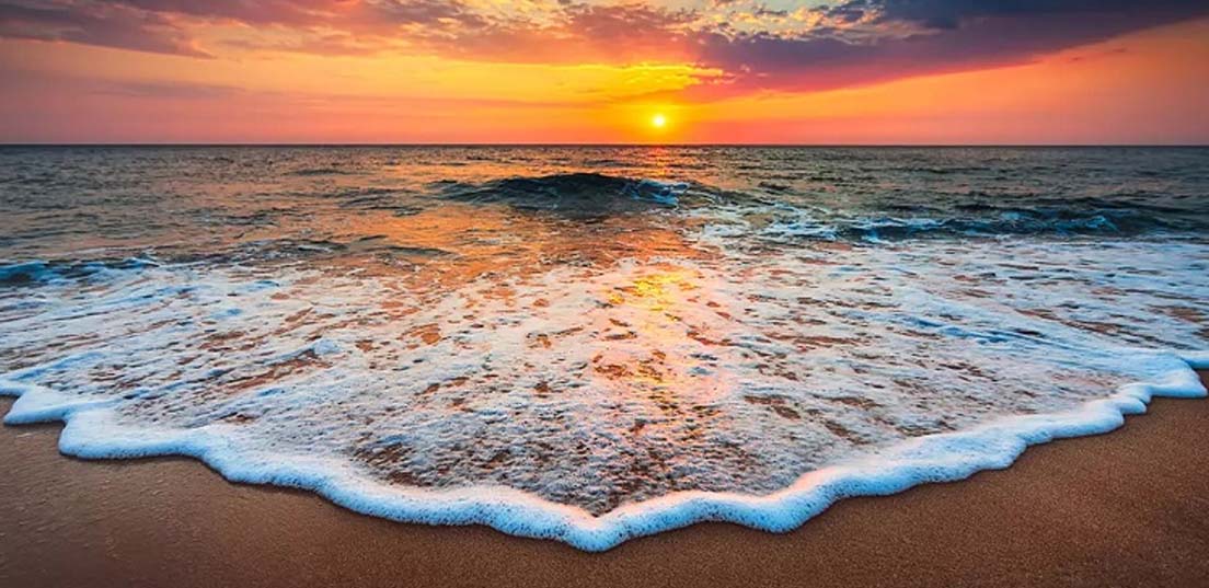 غروب ساحل مرجان